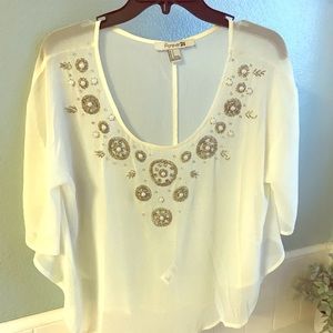 Sheer sequined poncho